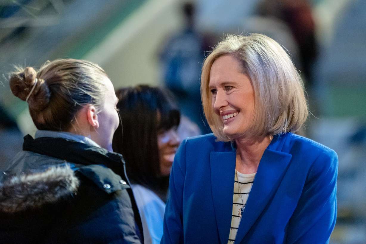 Bonnie H. Cordon, then Young Women general president of The Church of Jesus Chris of Latter-day saints, speaks with a devotional attendee at Brigham Young University on Feb. 4, 2020.
