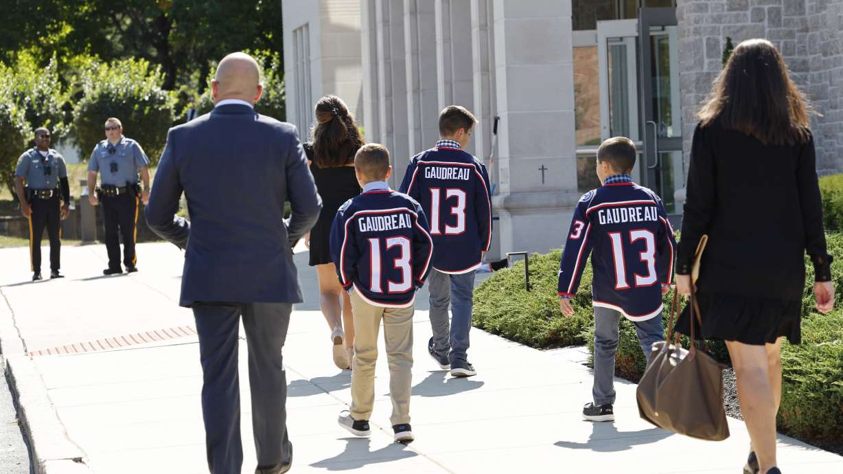 Young attendees wear Johnny Gaudreau's Columbus Blue Jackets jersey to the funeral services for Johnny Gaudreau and Matthew Gaudreau at Saint Mary Magdalen Church in Media, Pa., Monday, Sept. 9, 2024.