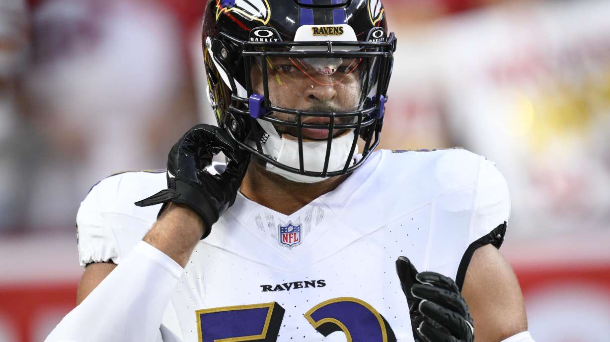 FILE -Baltimore Ravens linebacker Kyle Van Noy takes part in drills before the start of an NFL football game against the Kansas City Chiefs, Thursday, Sept. 5, 2024 in Kansas City, Mo. The Chiefs defeated the Ravens by a score of 27-20.
