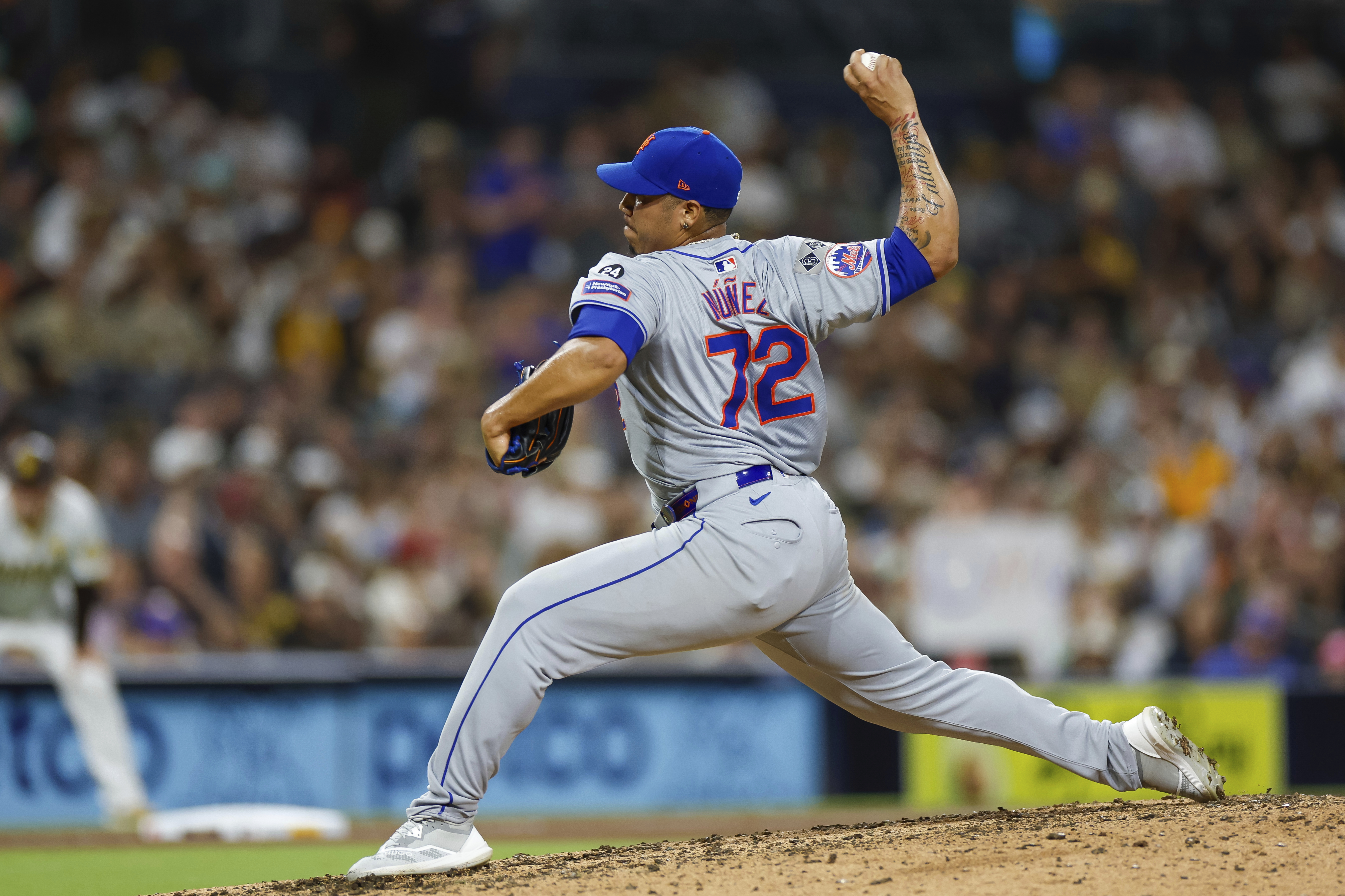 New York Mets relief pitcher Dedniel Nunez throws during the ninth inning of a baseball game against the San Diego Padres, Saturday, Aug. 24, 2024, in San Diego.