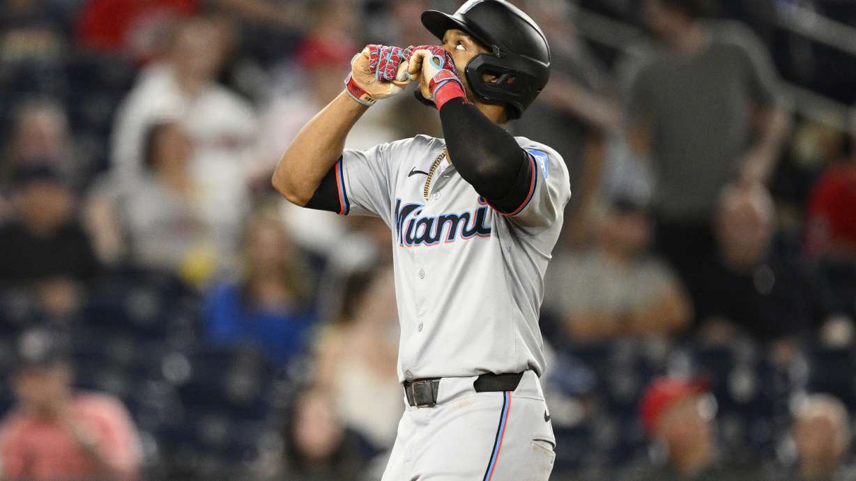 Miami Marlins' Otto Lopez celebrates after his home run during the fourth inning of a baseball game against the Washington Nationals, Friday, Sept. 13, 2024, in Washington.