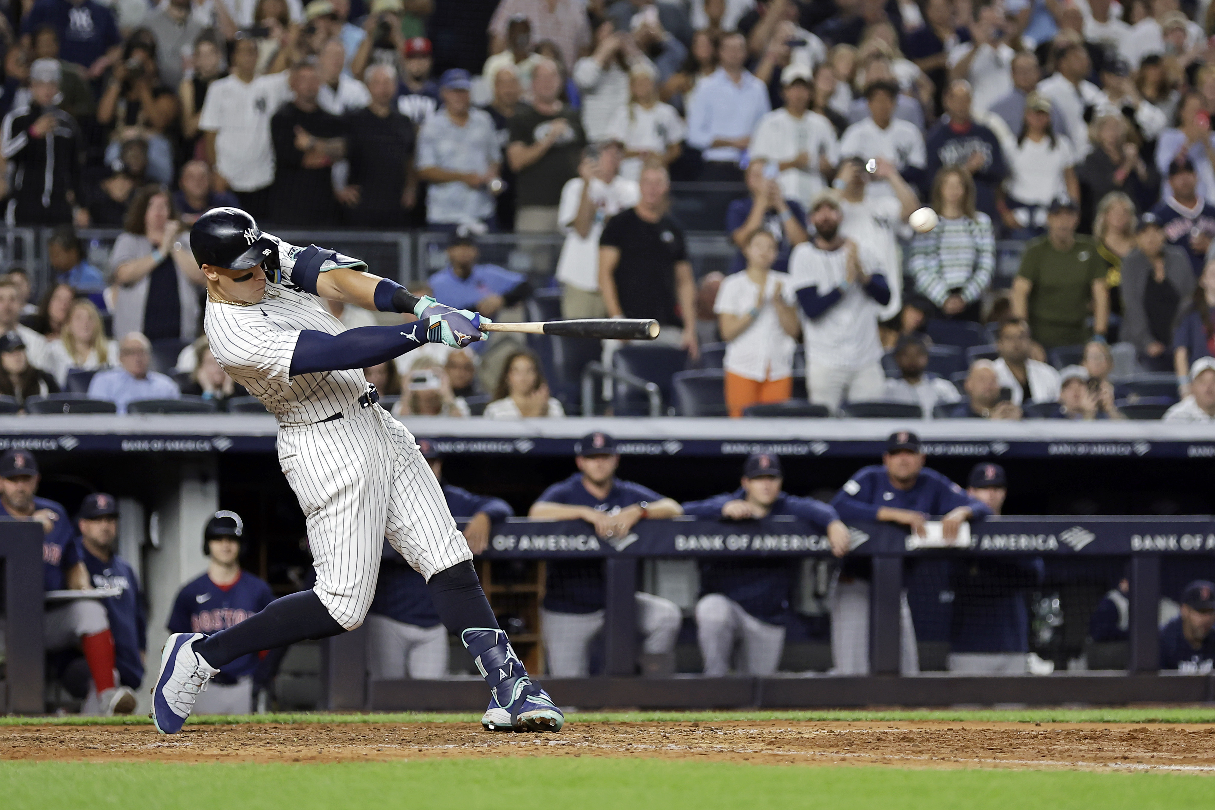 New York Yankees' Aaron Judge hits a grand slam during the seventh inning of a baseball game at bat Friday, Sept. 13, 2024, in New York.
