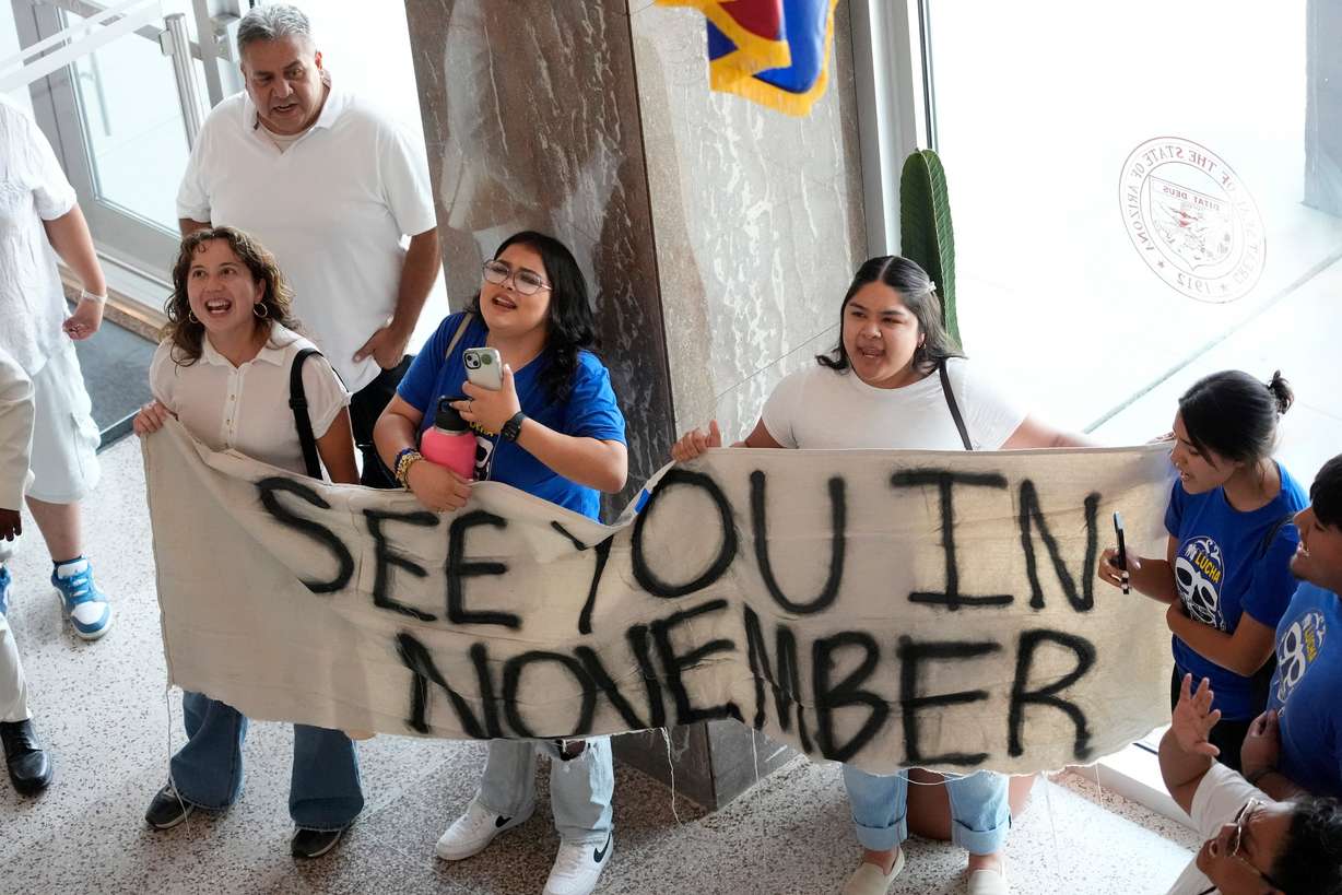 Opponents gather inside the Arizona State Capitol, Tuesday, June 4, 2024, in Phoenix after the Arizona legislature gave final approval to a the proposal that will ask voters to make it a state crime for noncitizens to enter the state through Mexico at any location other than a port of entry.