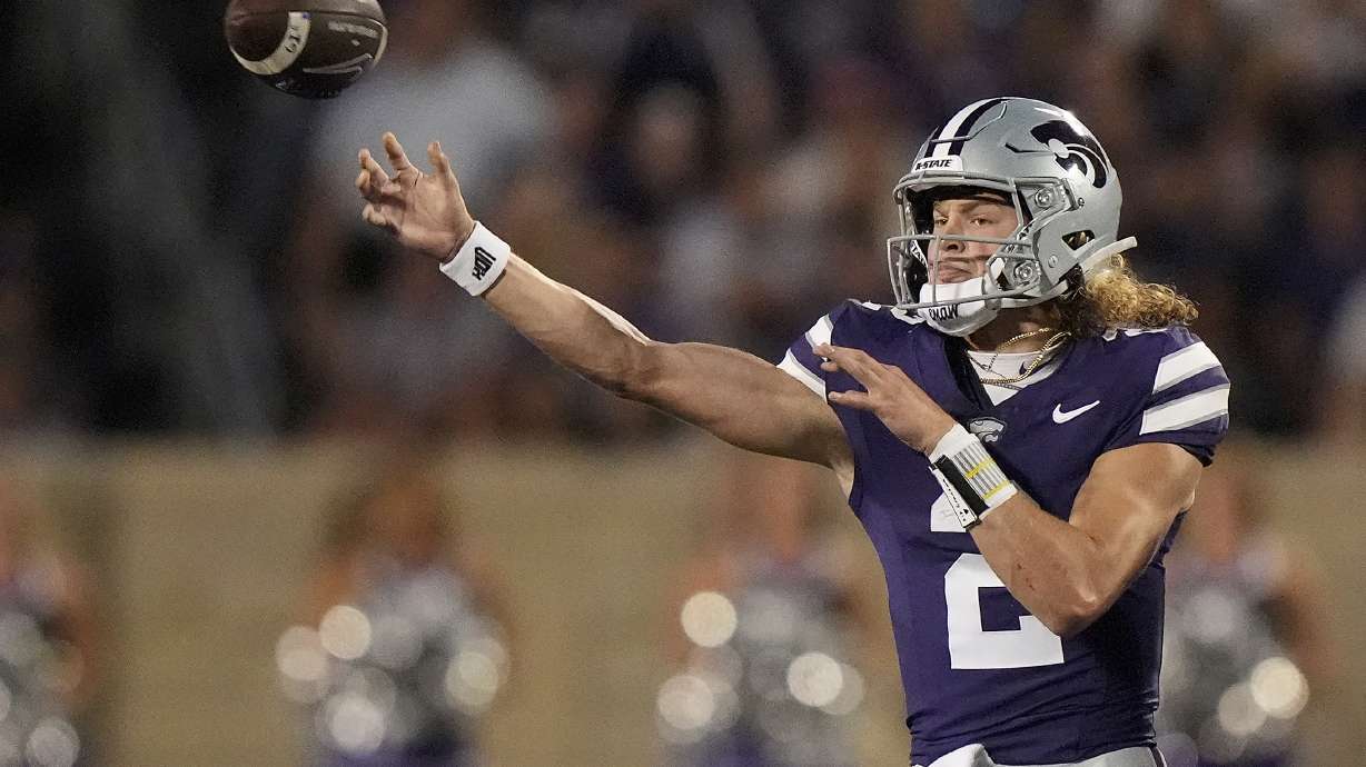 Kansas State quarterback Avery Johnson passes during the first half of an NCAA college football game against Arizona Friday, Sept. 13, 2024, in Manhattan, Kan.