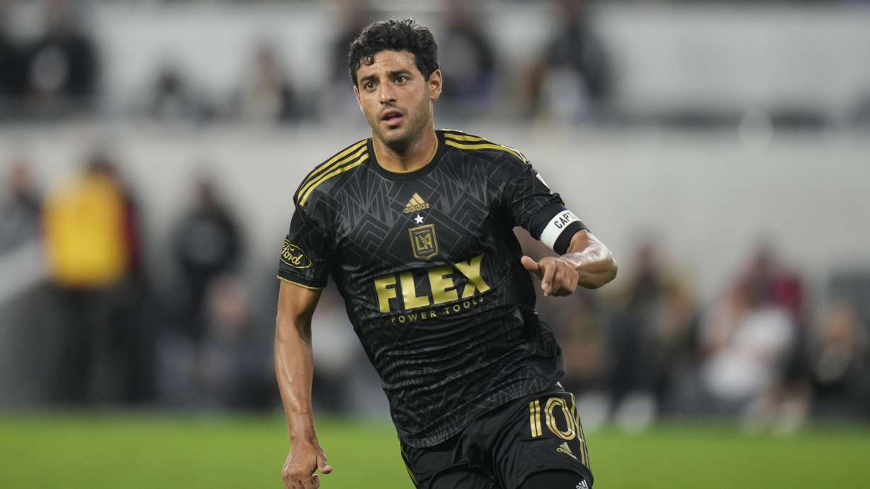 FILE - Los Angeles FC forward Carlos Vela chases the ball during the second half of an MLS soccer match against the Real Salt Lake on Oct. 1, 2023, in Los Angeles.
