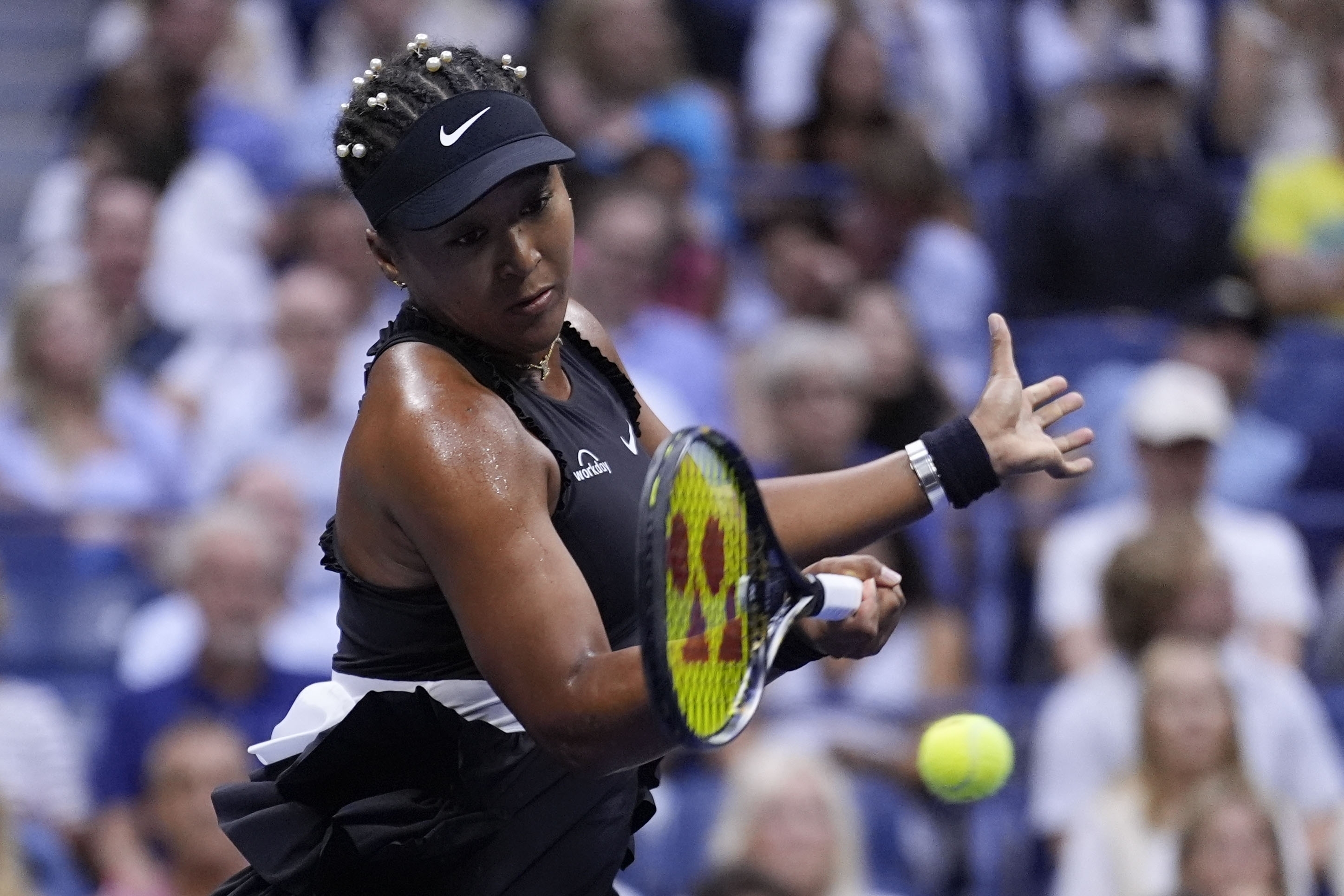 Naomi Osaka, of Japan, returns a shot to Karolina Muchova, of the Czech Republic, during a second round match of the U.S. Open tennis championships, Thursday, Aug. 29, 2024, in New York.