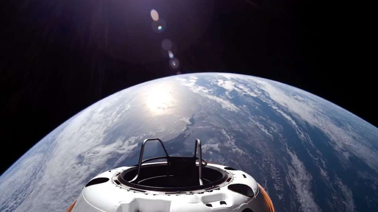 The Polaris Dawn mission's Crew Dragon capsule is seen Wednesday 870 miles above Earth — the farthest humans have traveled since the Apollo program over 50 years ago.