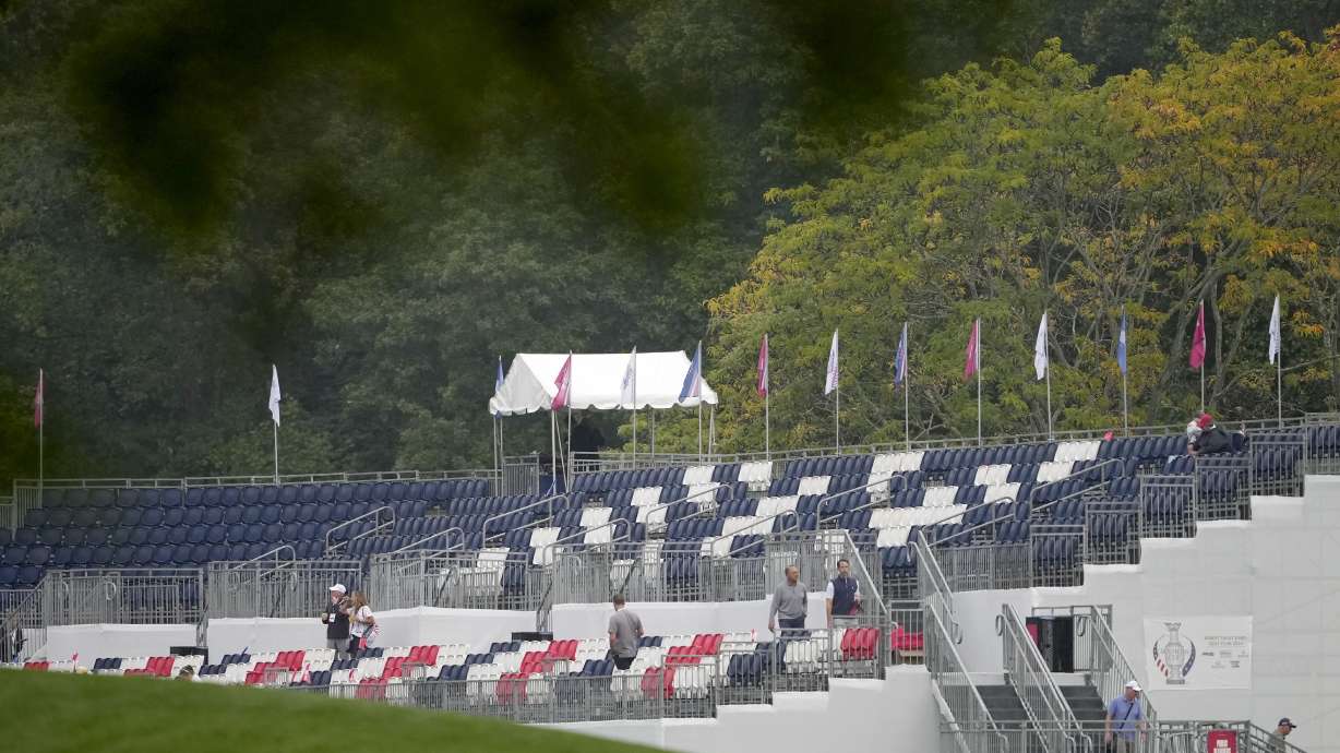Empty seats on a grandstand are seen on the first hole during a Solheim Cup golf tournament foursomes match at Robert Trent Jones Golf Club, Friday, Sept. 13, 2024, in Gainesville, VA.