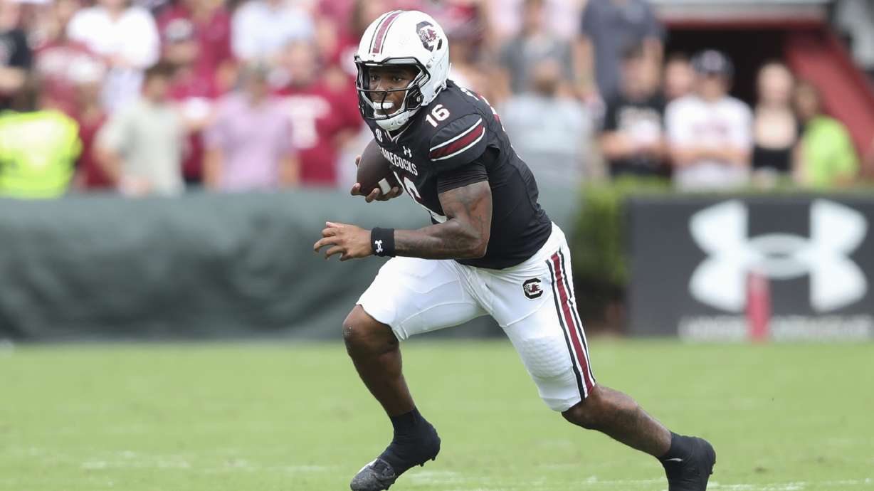 South Carolina quarterback LaNorris Sellers (16) runs for a short gain during the first half of an NCAA college football game against LSU, Saturday, Sept. 14, 2024 in Columbia, S.C.
