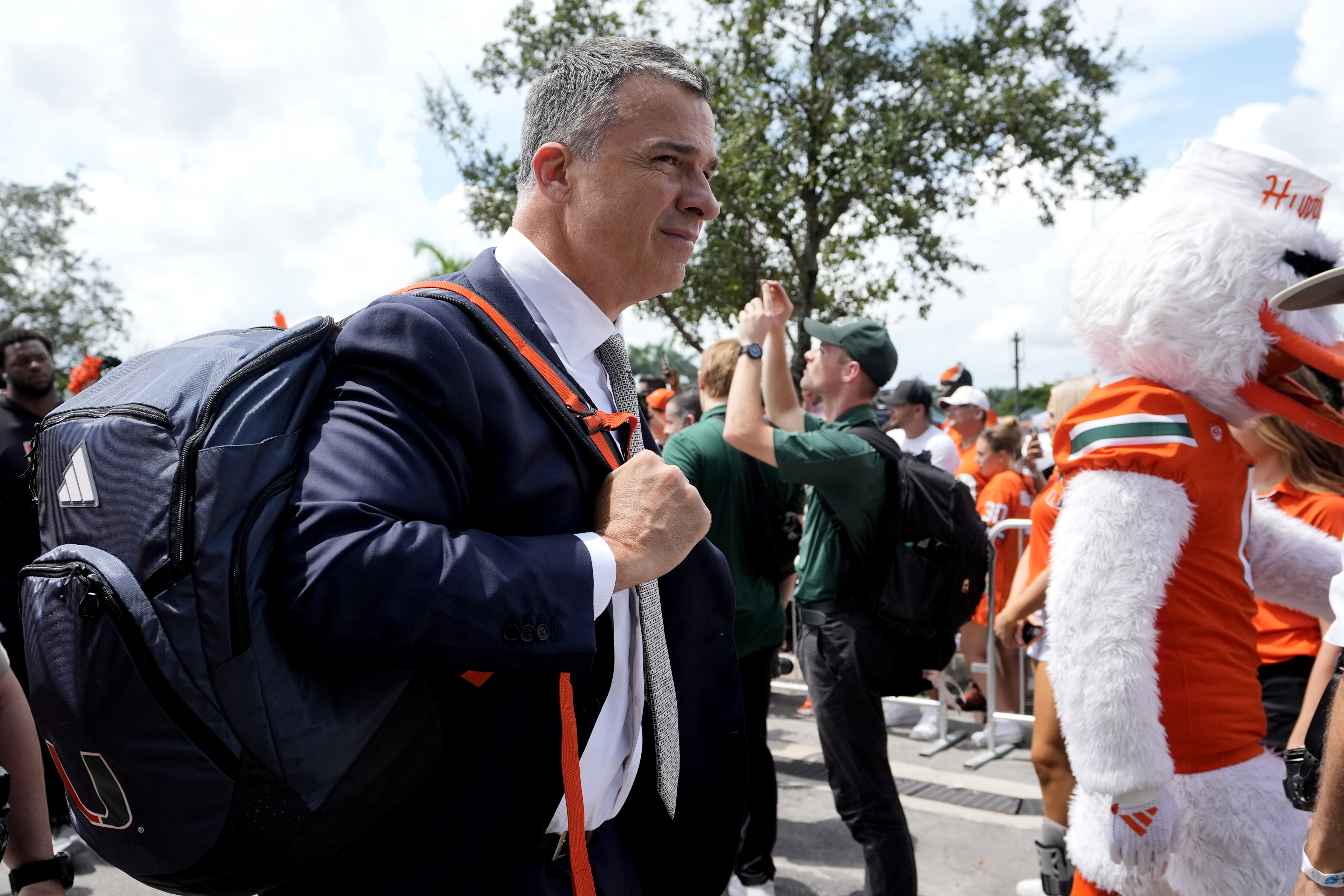 Miami head coach Mario Cristobal arrives for an NCAA football game against Ball State, Saturday, Sept. 14, 2024, in Miami Gardens, Fla.