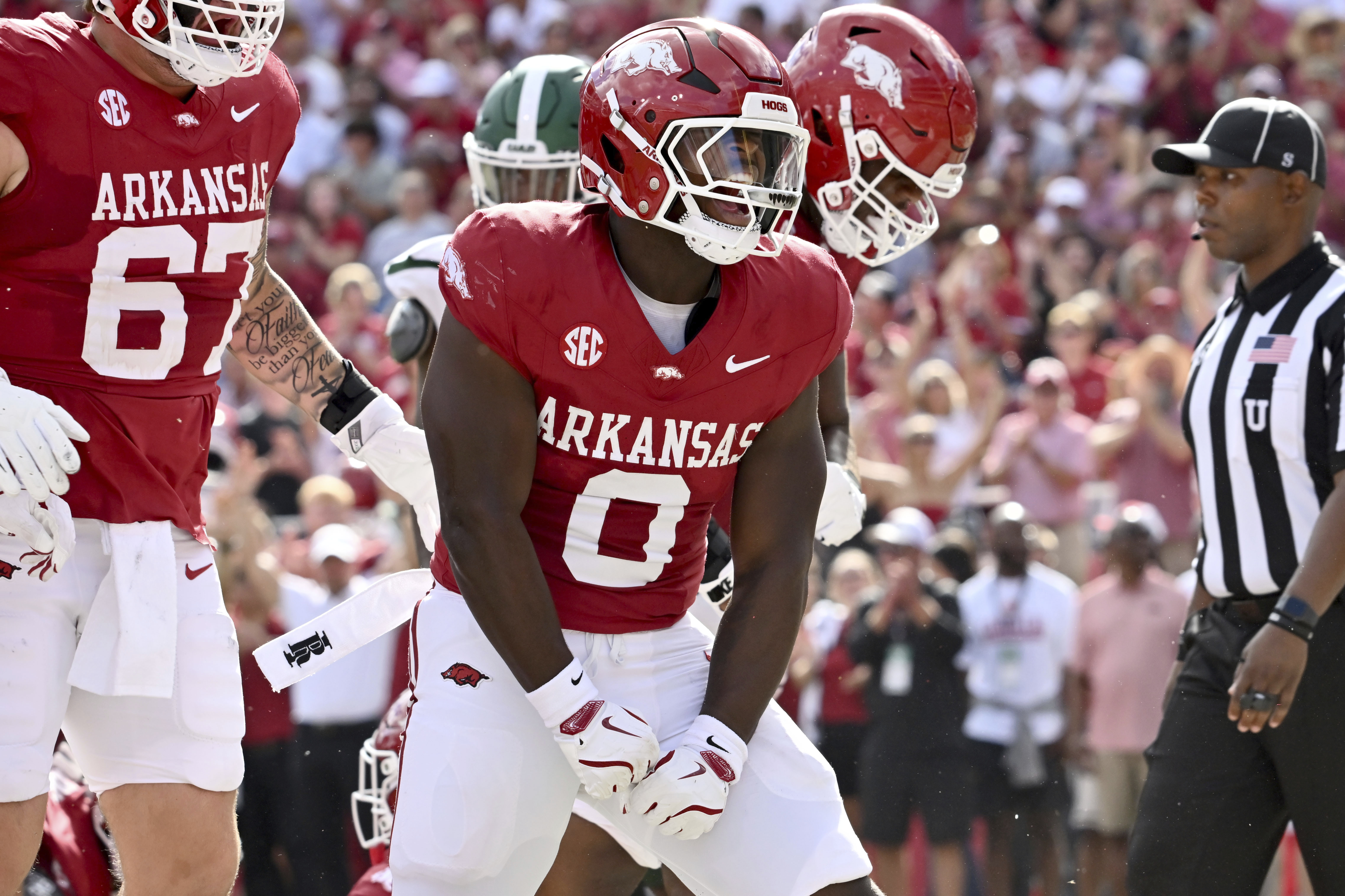 Arkansas running back Braylen Russell (0) celebrates after running for a touchdown against UAB during an NCAA college football game, Saturday, Sept. 14, 2024, in Fayetteville, Ark.
