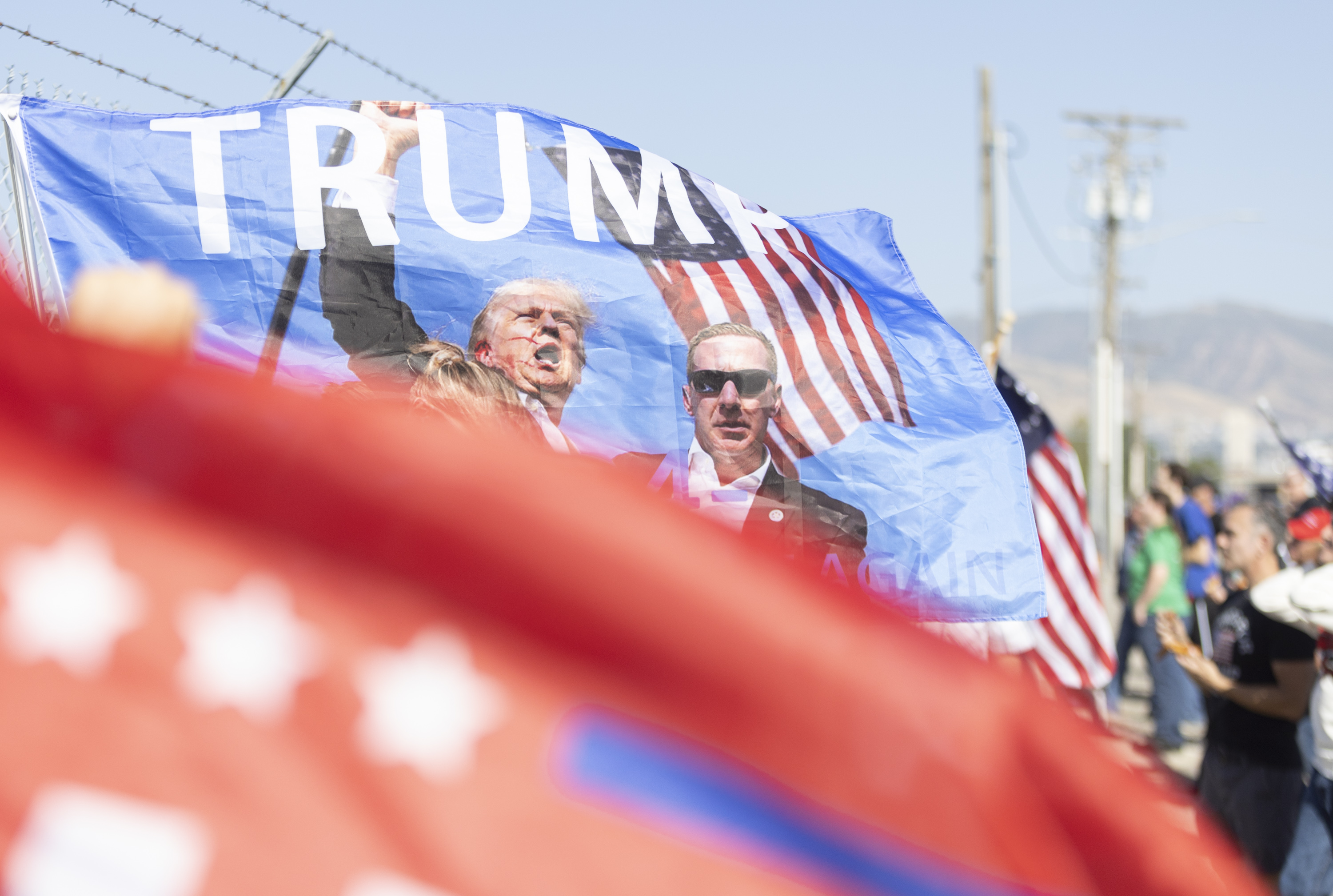 Trump supporters gather to watch Donald Trump’s plane land at Salt Lake City International Airport for a fundraiser in Salt Lake City on Sept. 14. A new Deseret News/Hinckley Institute of Politics poll shows Trump is polling 30 percentage points ahead of Harris among Utah voters.