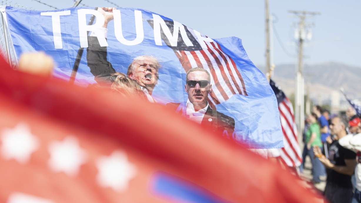 Trump supporters gather to watch Donald Trump’s plane land at Salt Lake City International Airport for a fundraiser in Salt Lake City on Sept. 14. A new Deseret News/Hinckley Institute of Politics poll shows Trump is polling 30 percentage points ahead of Harris among Utah voters.
