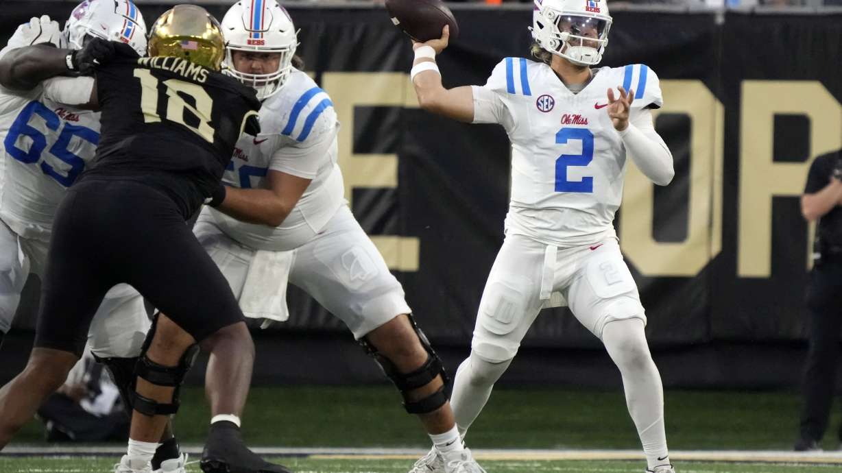 Mississippi quarterback Jaxson Dart (2) looks to pass against Wake Forest during the first half of an NCAA college football game in Winston-Salem, N.C., Saturday, Sept. 14, 2024.