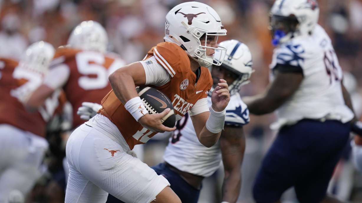 Texas quarterback Arch Manning (16) runs for a 67-yard touchdown against UTSA during the first half of an NCAA college football game in Austin, Texas, Saturday, Sept. 14, 2024.