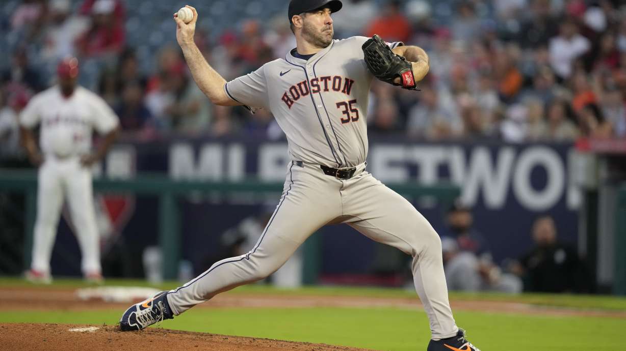 Houston Astros starting pitcher Justin Verlander throws during the first inning of a baseball game against the Los Angeles Angels in Anaheim, Calif., Saturday, Sept. 14, 2024.