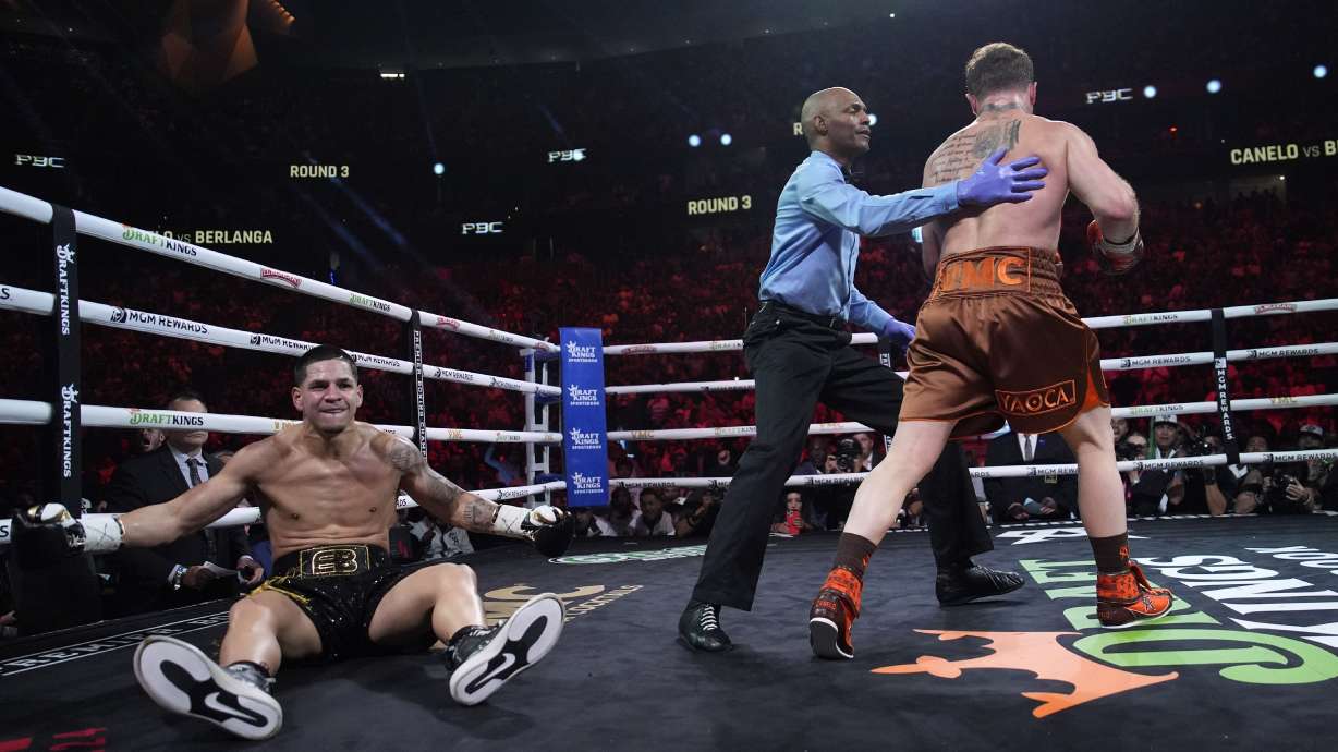 Canelo Alvarez knocks down Edgar Berlanga in a super middleweight title bout Saturday, Sept. 14, 2024, in Las Vegas.