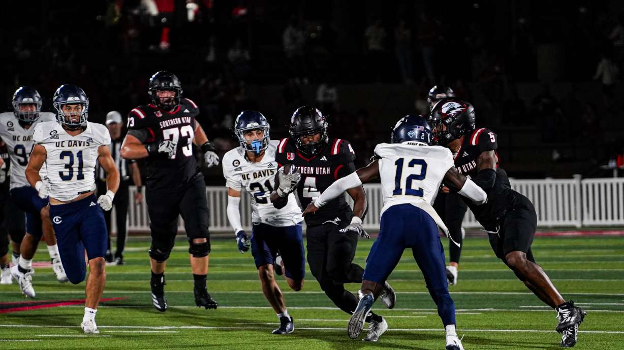 Southern Utah's Targhee Lambson rushes for a first down.