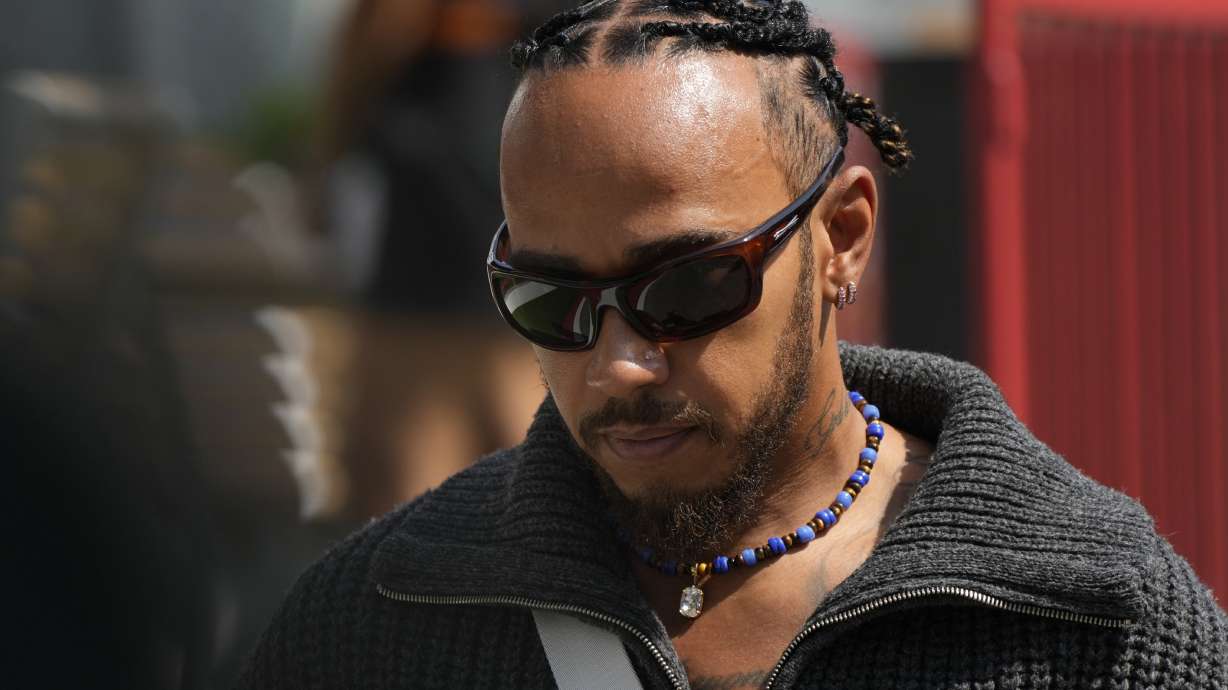 Mercedes driver Lewis Hamilton of Britain walks in the paddock at the Baku circuit, in Baku, Azerbaijan, Thursday, Sept.12, 2024. The Formula One Grand Prix will be held on Sunday.