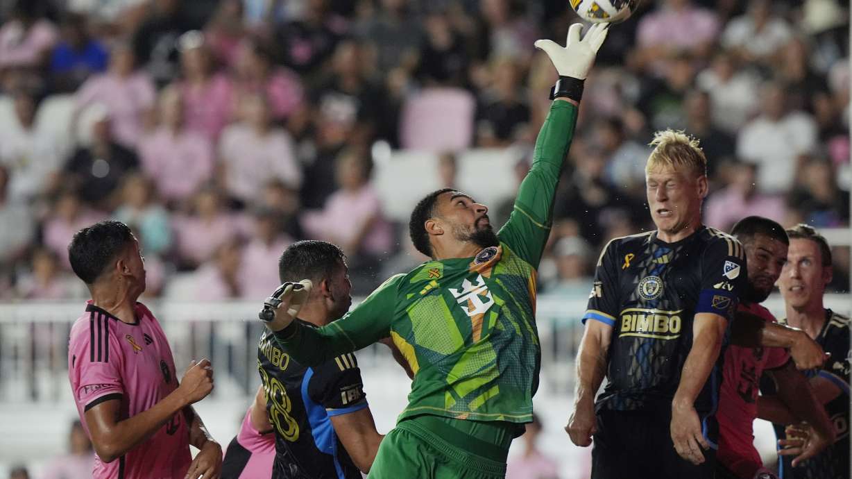 Inter Miami goalkeeper Drake Callender (1) deflects a corner kick during the first half of an MLS soccer match against the Philadelphia Union, Saturday, Sept. 14, 2024, in Fort Lauderdale, Fla.
