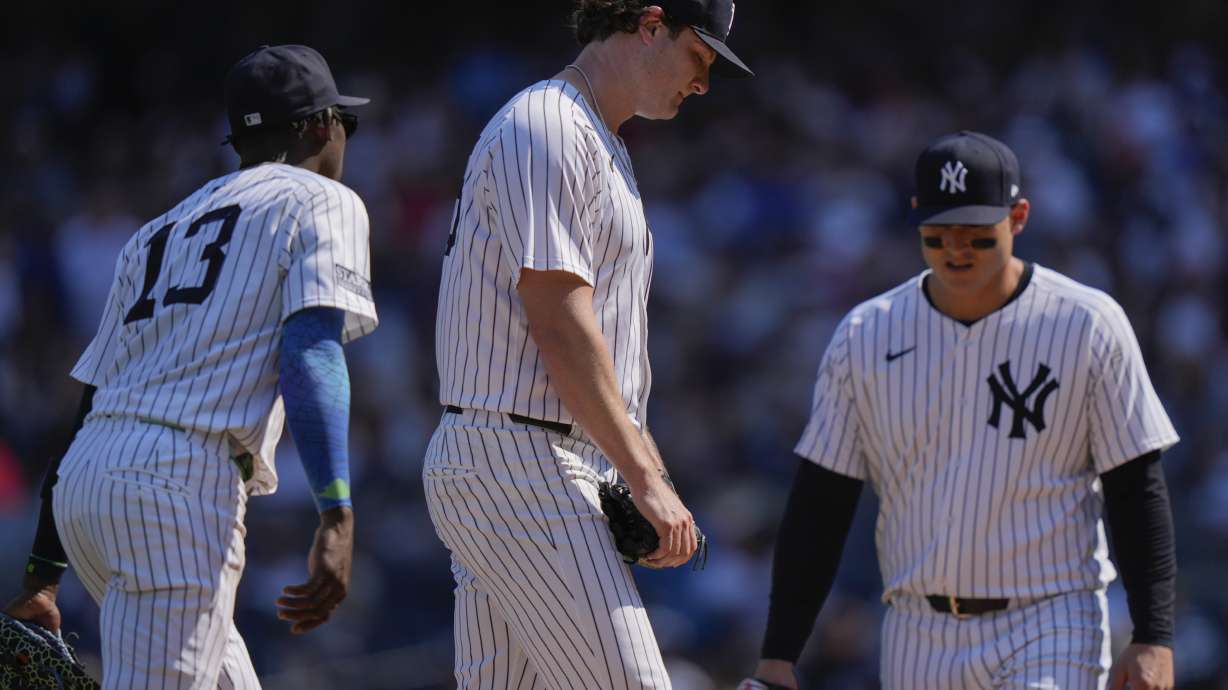New York Yankees pitcher Gerrit Cole reacts after Boston Red Sox's Masataka Yoshida, of Japan, hit a two-run single during the fifth inning of a baseball game Saturday, Sept. 14, 2024, in New York.