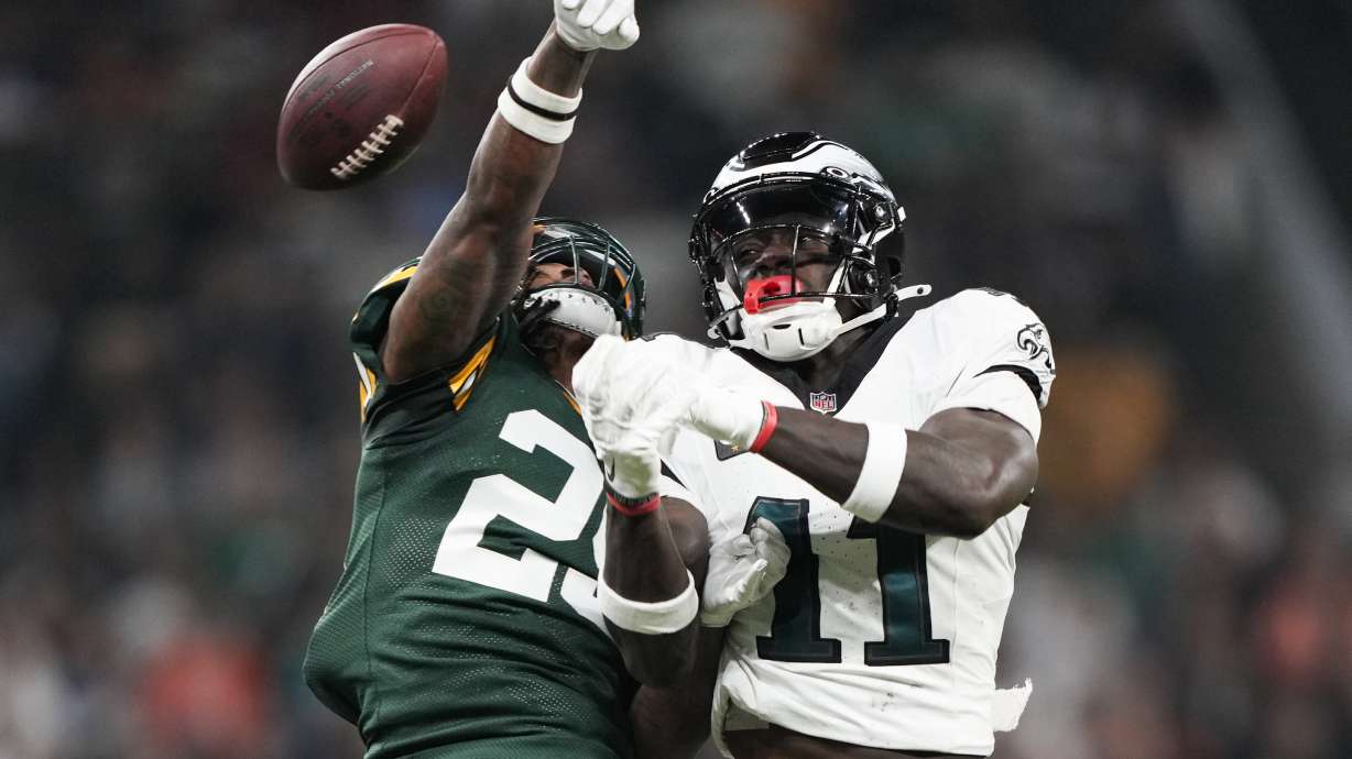 Green Bay Packers cornerback Keisean Nixon (25) breaks up a pass intended for Philadelphia Eagles wide receiver A.J. Brown (11) during the first half of an NFL football game, Friday, Sept. 6, 2024, at the Neo Quimica Arena in Sao Paulo.