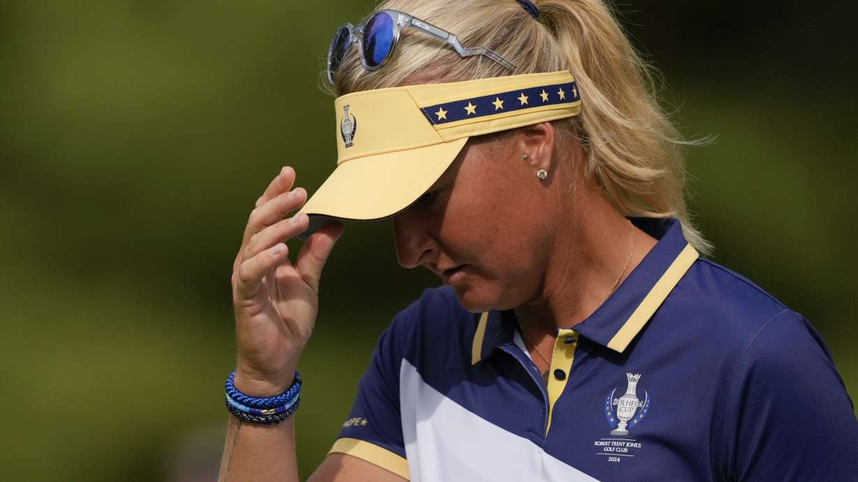 Europe's Vice Captain Anna Nordqvist reacts after missing a putt on the sixth green during a Solheim Cup golf tournament singles match at the Robert Trent Jones Golf Club, Sunday, Sept. 15, 2024, in Gainesville, Va.