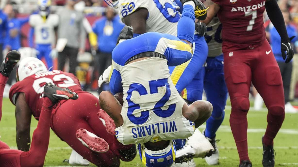 Los Angeles Rams running back Kyren Williams (23) scores a touchdown against the Arizona Cardinals during the second half of an NFL football game, Sunday, Sept. 15, 2024, in Glendale, Ariz.