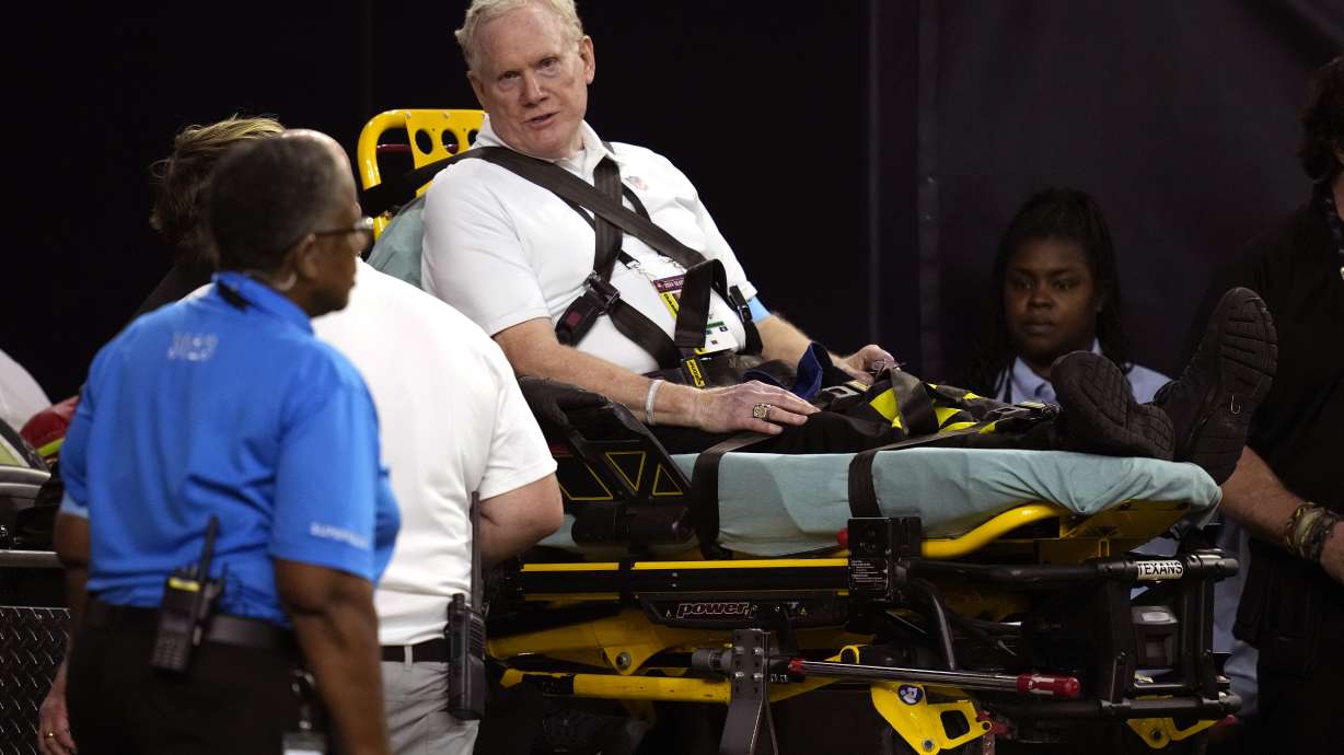 A member of the sideline chain crew is taken off the field on a cart after being injured during the second half of an NFL football game between the Houston Texans and the Chicago Bears Sunday, Sept. 15, 2024, in Houston.