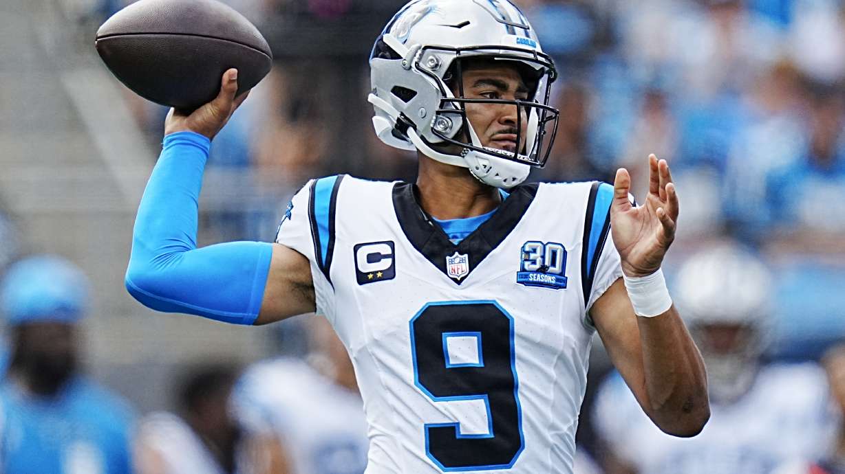 Carolina Panthers quarterback Bryce Young passes against the Los Angeles Chargers during the first half of an NFL football game on Sunday, Sept. 15, 2024, in Charlotte, N.C.