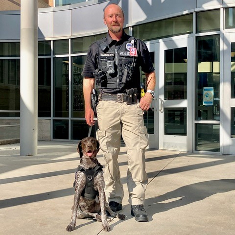 Ogden Police Officer R. Mackley and Piper, the new firearms- and explosives-sniffing K-9 serving Ogden School District schools, in an undated photo at Ben Lomond High School in Ogden. Mackley handles the K-9.