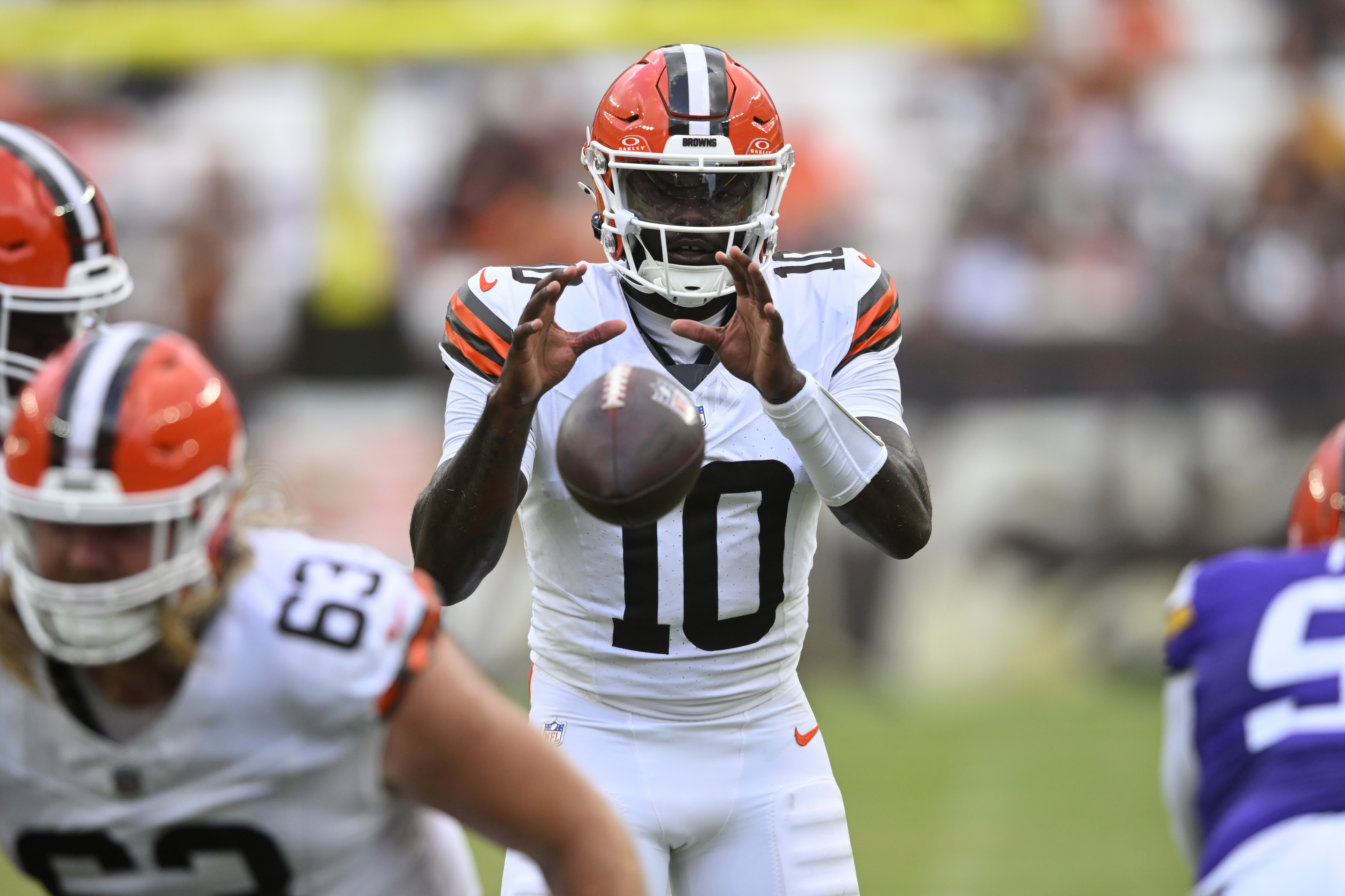 Cleveland Browns quarterback Tyler Huntley (10) takes the snap against the Minnesota Vikings during the second half of an NFL preseason football game, Saturday, Aug. 17, 2024, in Cleveland.