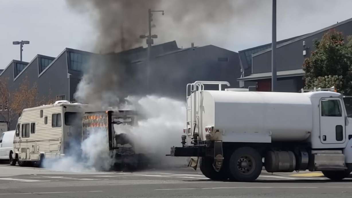 Firefighters in California arrived on the scene in April to handle a box truck fire, but a passing water truck managed the flames in seconds.