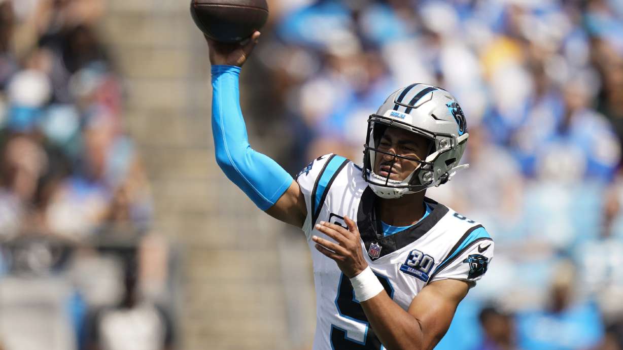 Carolina Panthers quarterback Bryce Young passes against the Los Angeles Chargers during the first half of an NFL football game on Sunday, Sept. 15, 2024, in Charlotte, N.C.