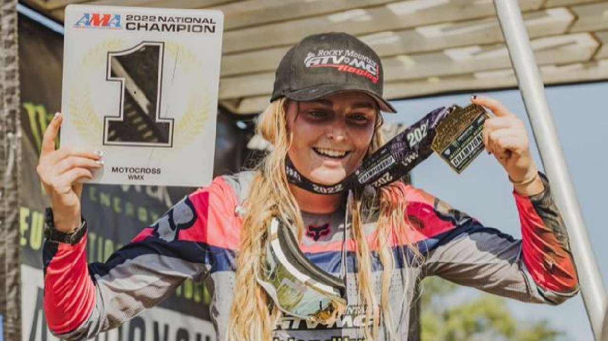 Sophie Phelps poses with her medal after winning her first national title at the 2021 Loretta Lynn Amateur Motocross Championships at the Loretta Lynn Ranch in Hurricane Mills, Tennessee.
