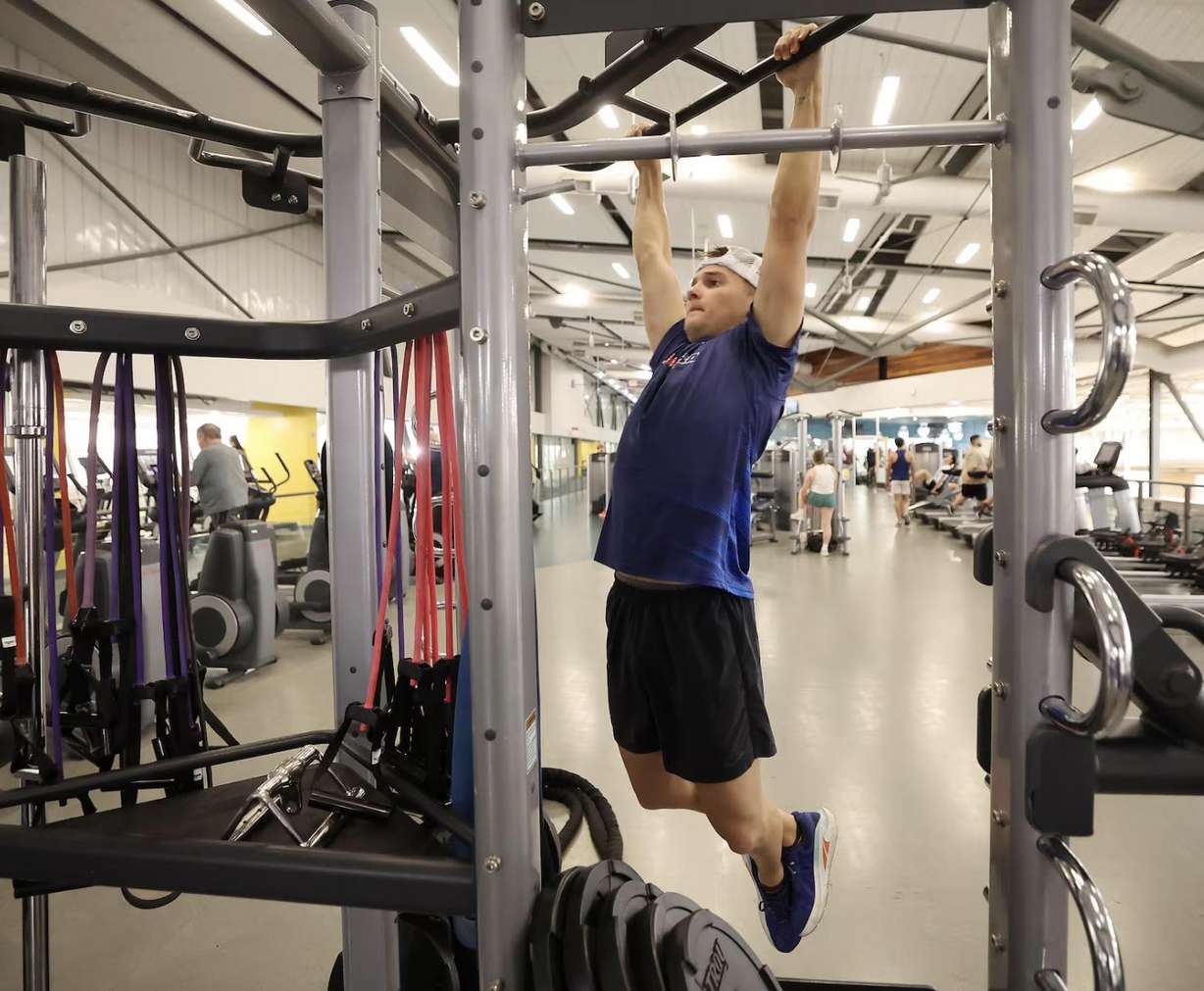 Alex Gilson works out at the Provo Recreation Center in Provo on Sept. 3, as he trains for an upcoming triathlon.