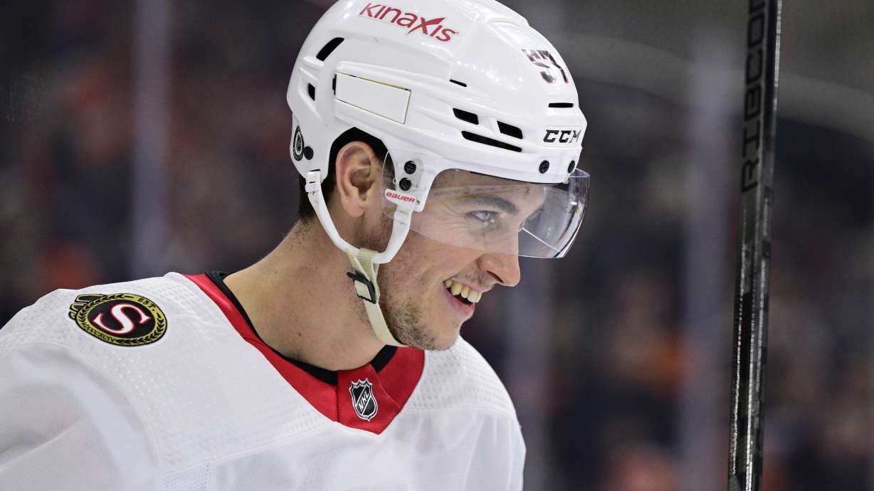 FILE - Ottawa Senators' Shane Pinto reacts during an NHL hockey game against the Philadelphia Flyers, Jan. 21, 2024, in Philadelphia.