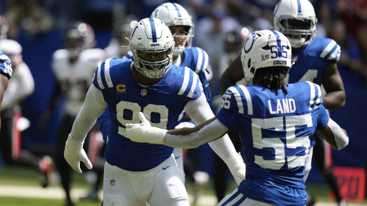 Indianapolis Colts defensive tackle DeForest Buckner celebrates a quarterback sack during the first half of an NFL football game against the Houston Texans, Sunday, Sept. 8, 2024, in Indianapolis.