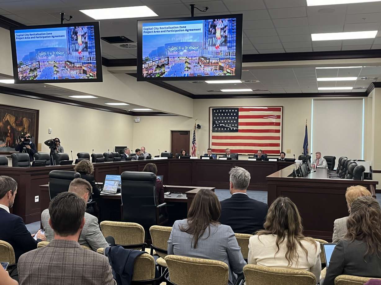 Salt Lake City representatives present their proposed agreement with Smith Entertainment Group to the Revitalization Zone Committee on Tuesday.
