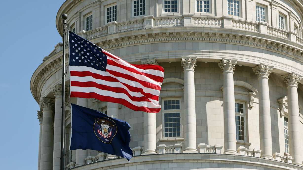 The American flag and the old state flag fly at the Capitol in Salt Lake City on May 16, 2023. Utah legislative leaders were briefed on the economy in the state on Tuesday.