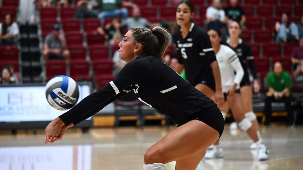 Sami Blackett makes a dig for Utah Valley Volleyball.