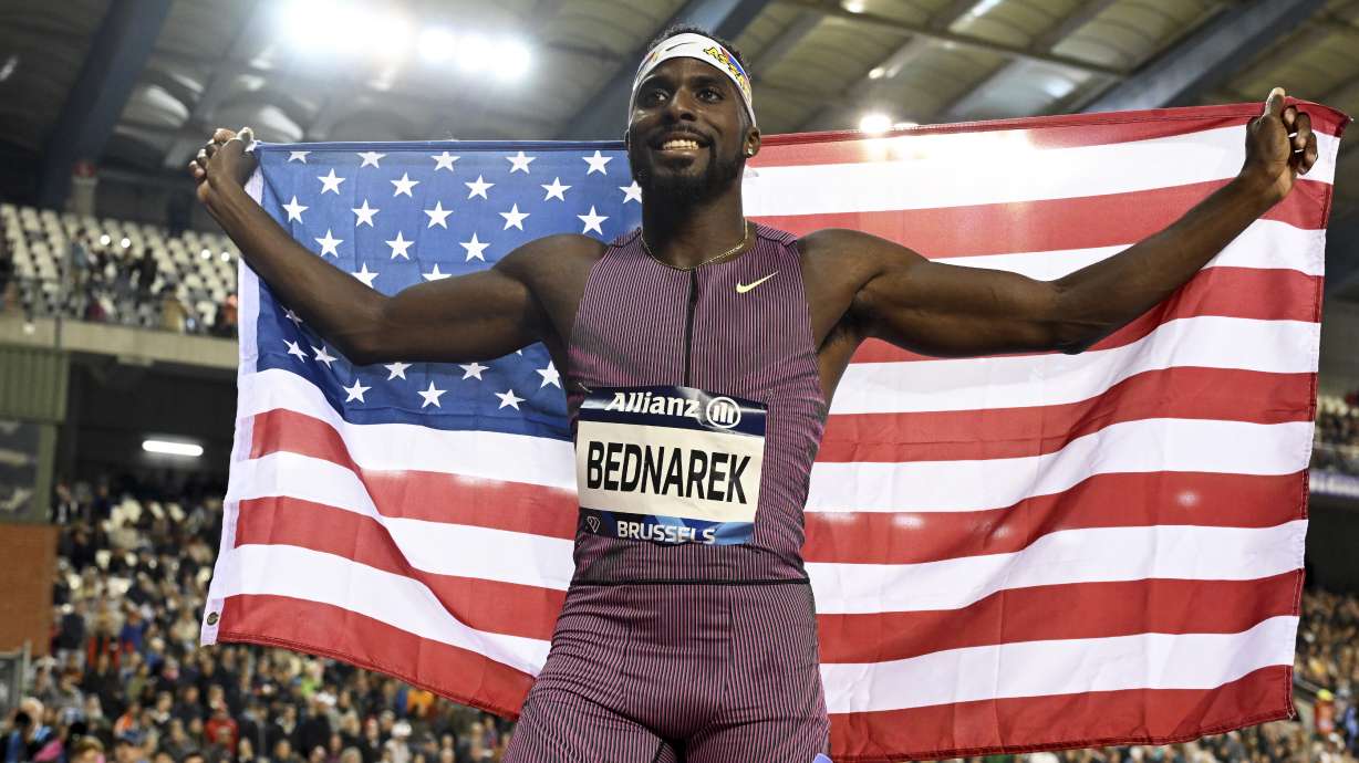 Kenneth Bednarek, of the United States, poses after winning the men's 200 meters during the Diamond League final 2024 athletics meet in Brussels, Saturday, Sept. 14, 2024.