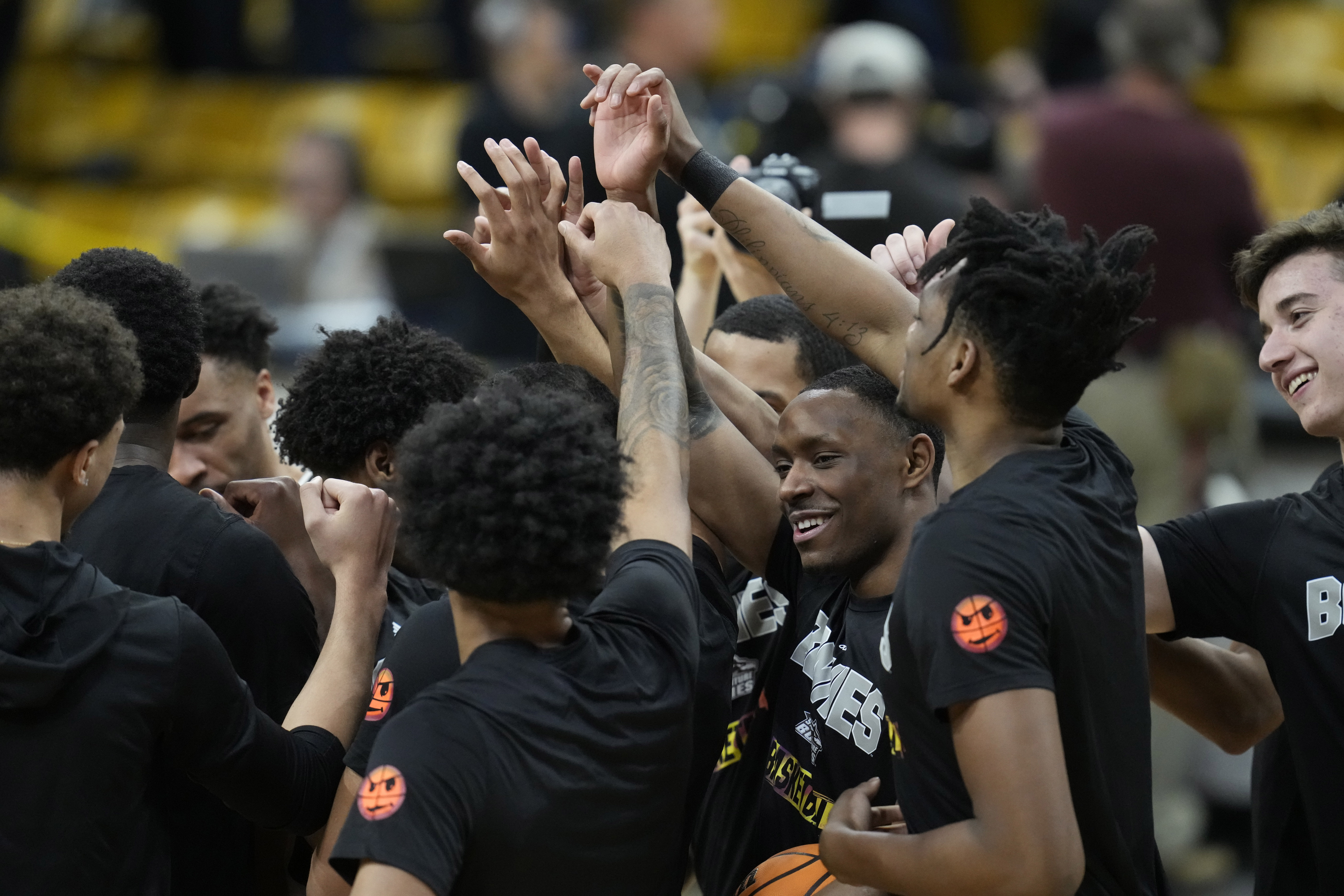 FILE - St. Bonaventure players huddle in the first half of a National Invitational Tournament basketball game on Tuesday, March 15, 2022, in Boulder, Colo.