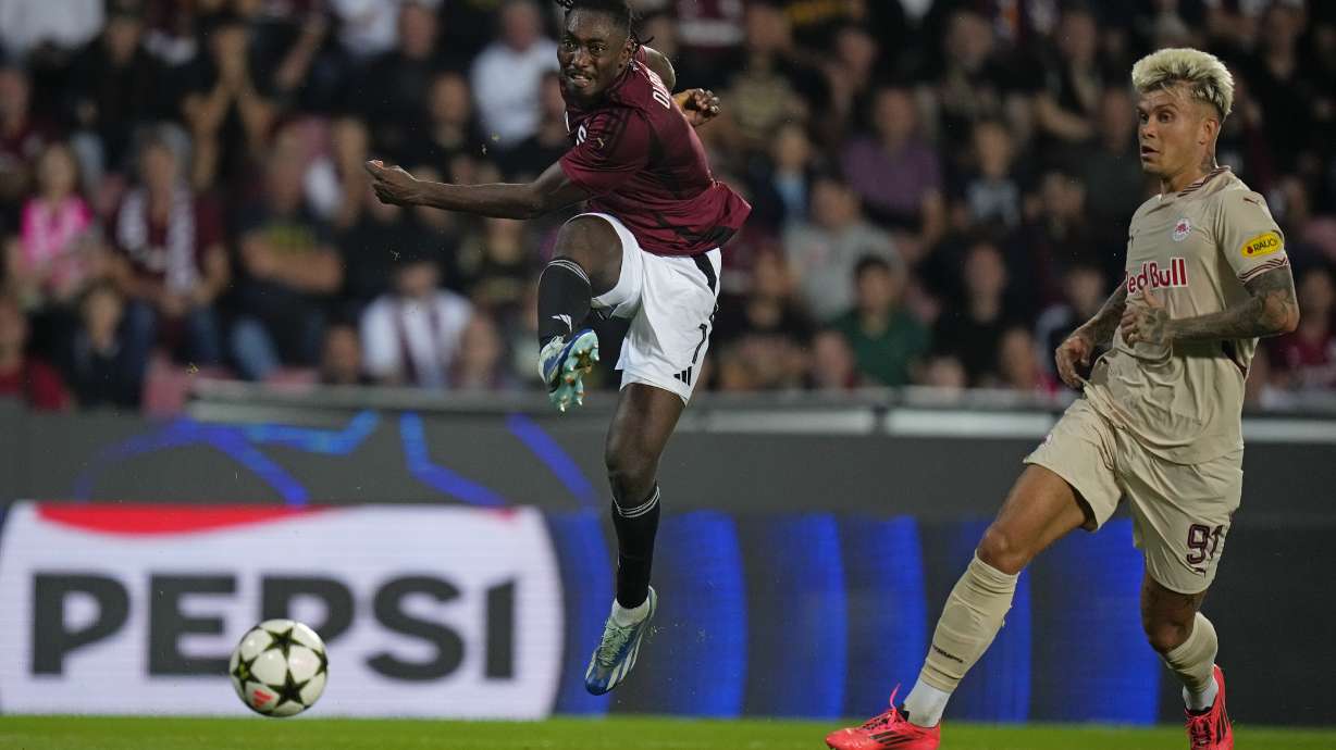 Sparta's Victor Olatunji scores his side's second goal during the Champions League opening phase soccer match between Sparta Prague and Salzburg in Prague, Czech Republic, Wednesday, Sept. 18, 2024.