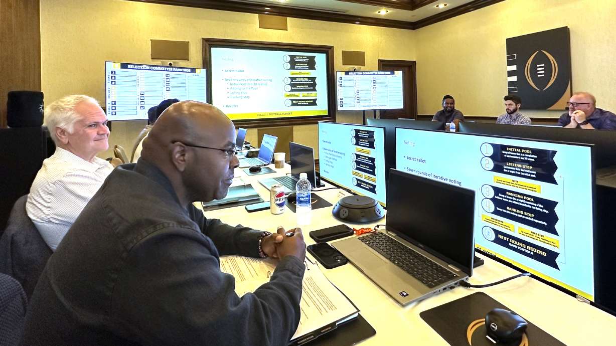 Media members and others participate in a mock College Football Playoff selection Friday, Sept. 13, 2024, in Grapevine, Texas.