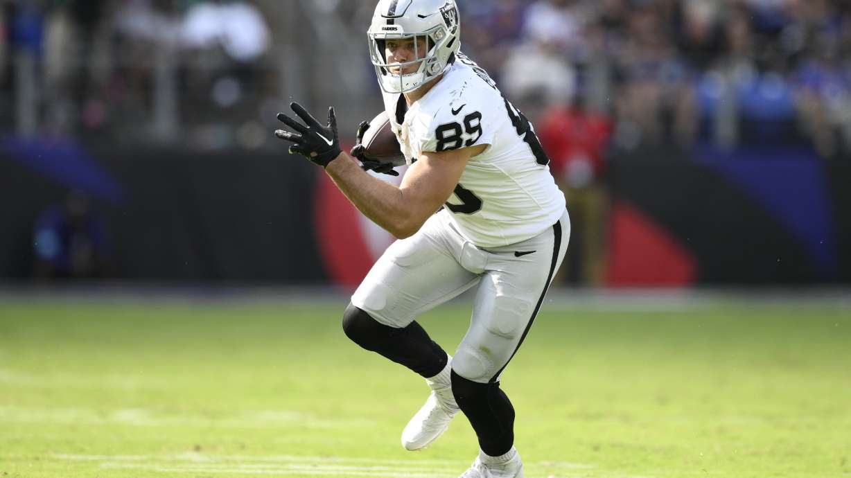 FILE - Las Vegas Raiders tight end Brock Bowers (89) carries the ball during the second half of an NFL football game against the Baltimore Ravens, Sept. 15, 2024, in Baltimore.