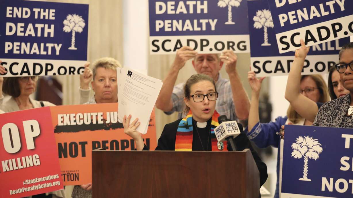 The Rev. Hillary Taylor at a news conference before delivering petitions to stop the execution of Freddie Owens at the South Carolina Statehouse in Columbia, S.C., Thursday. A friend whose testimony helped send Owens to prison is saying he lied.
