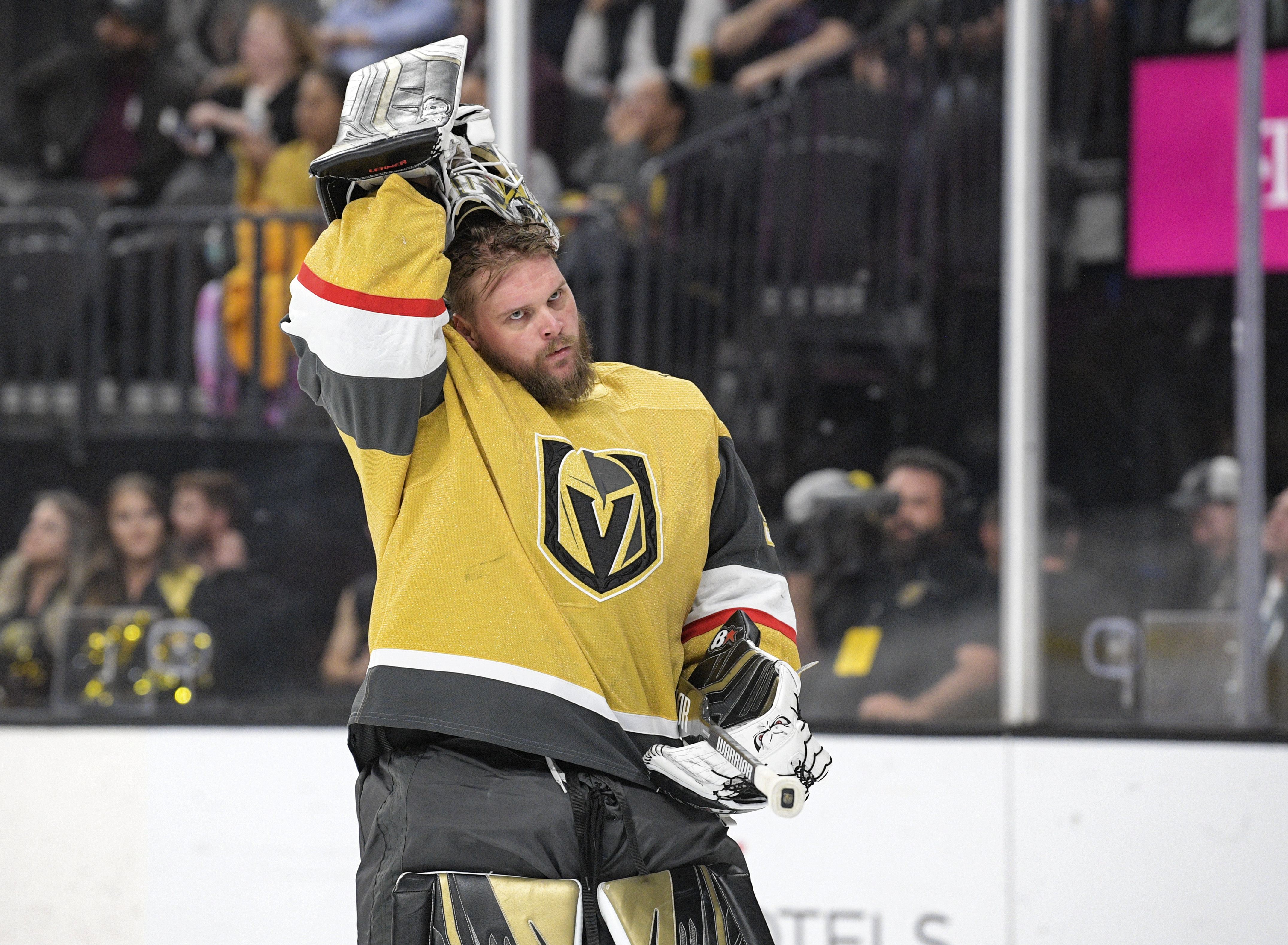 FILE - Vegas Golden Knights goaltender Robin Lehner puts his helmet on before the team's NHL game against the Washington Capitals on Wednesday, April 20, 2022, in Las Vegas.