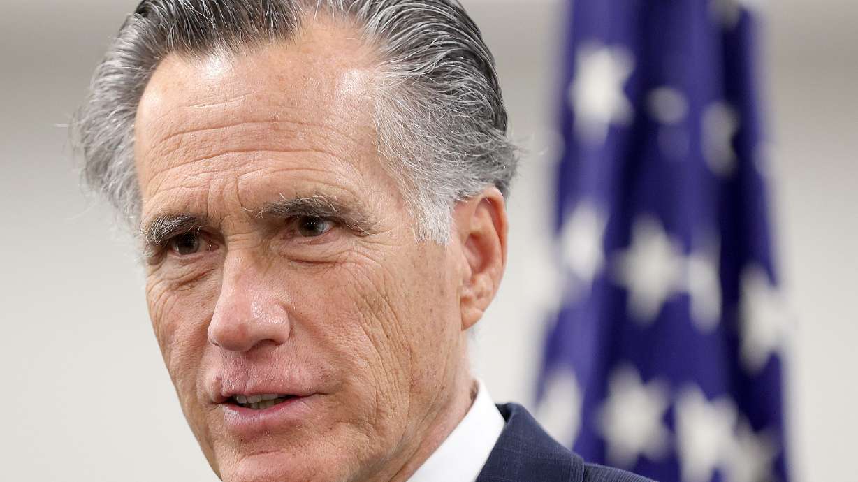 Sen. Mitt Romney, R-Utah, speaks at the Wallace F. Bennett Federal Building in Salt Lake City on Feb. 16. Romney and his colleagues are attempting to curb widespread fraud by ending a COVID-19-era tax credit.