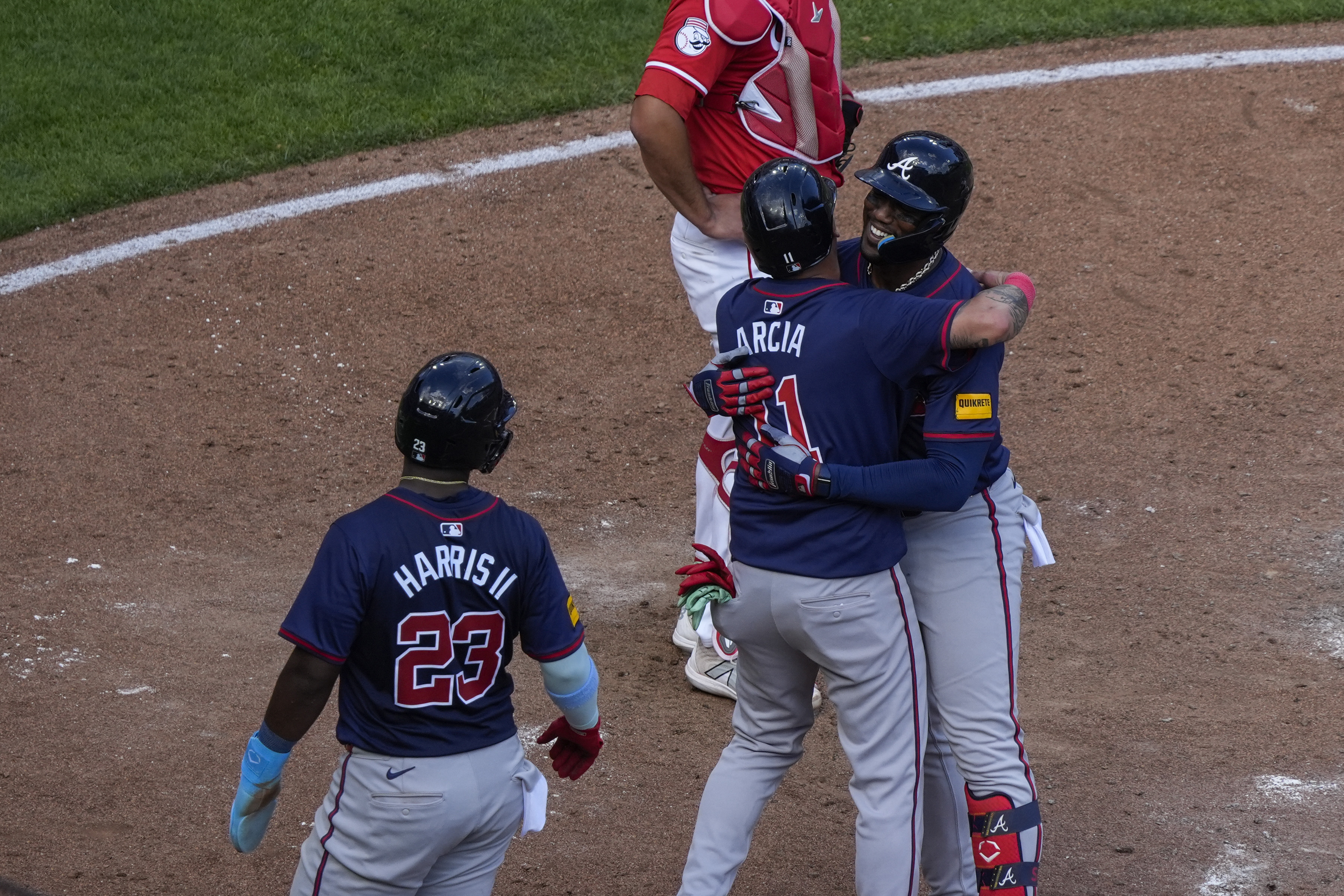 Olson homers twice and Sale wins his major league-leading 18th as the Braves rout the Reds 15-3